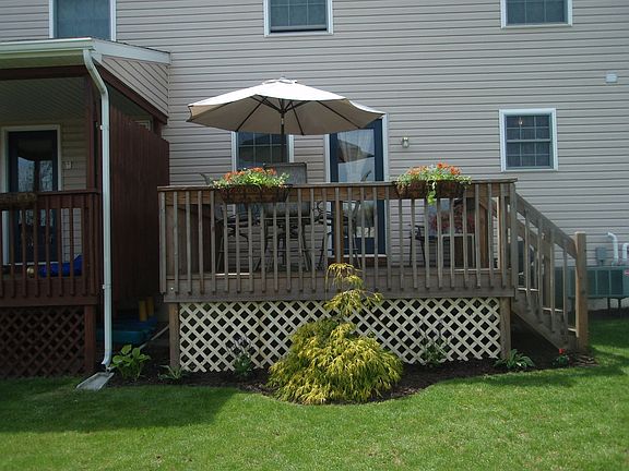 Landscaped back deck with yard