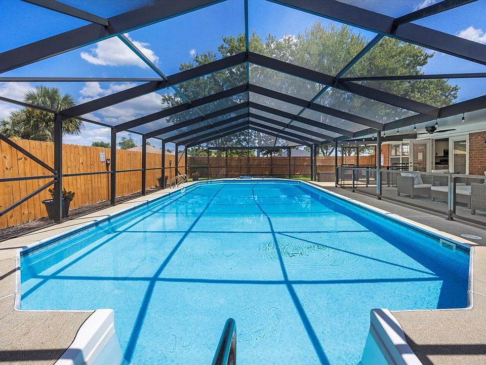 Pool with cage and safety gate