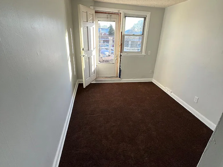 Left side secondary bedroom.