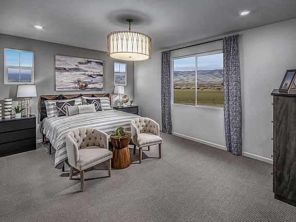 Residence 4 primary suite modeled at a nearby Meritage community.