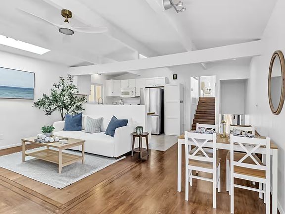 Dining table adjacent to the living room and the Kitchen