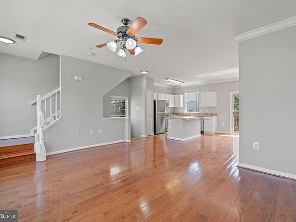 Open space flooring with lots of lighting and beautiful wood flooring