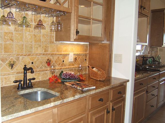 Granite throughout even this wet bar
