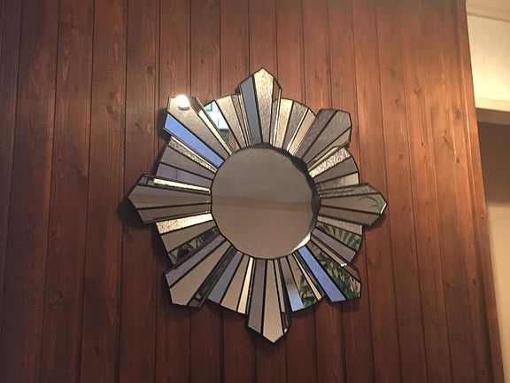 Exquisite cut glass mirror over Fireplace