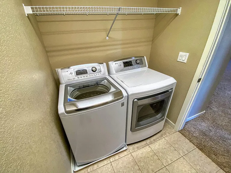 Upper level - laundry room (7' x 6').