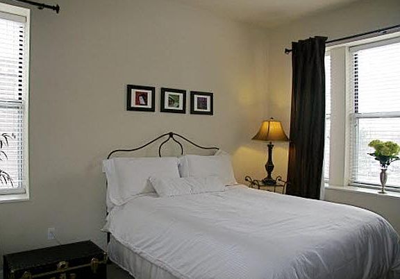 Sunny and bright bedroom with large closet