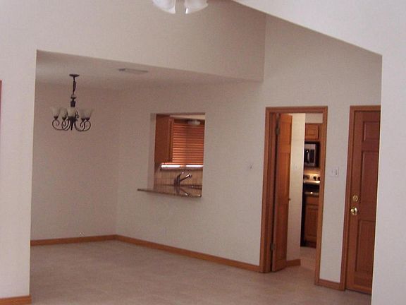 Living/family room, view into dining area/kitchen