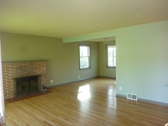 Gleaming exposed oak hardwood floors will greet you as you enter this wonderful home. Two tone paint, three spacious bedrooms on the main floor.