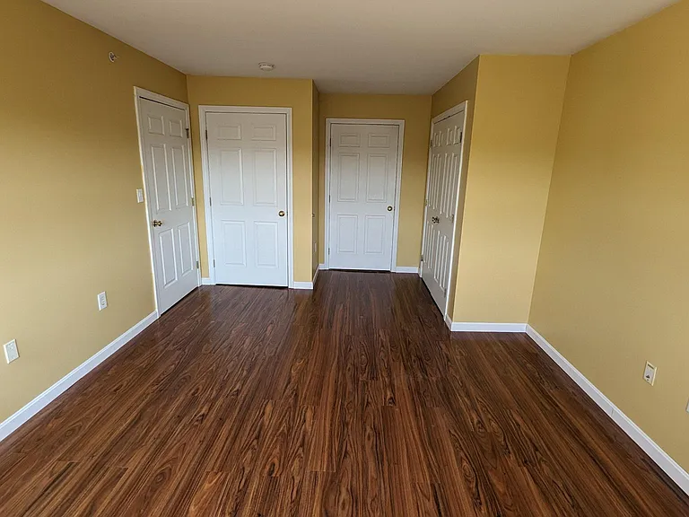 Primary bedroom: 
12' x 18'6", 2 closets, hardwood floor