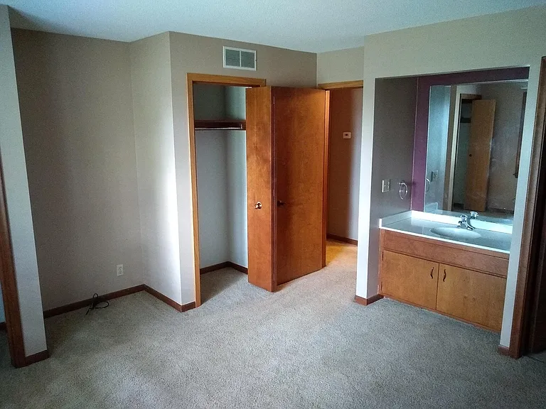 Back bedroom has sink and toilet.