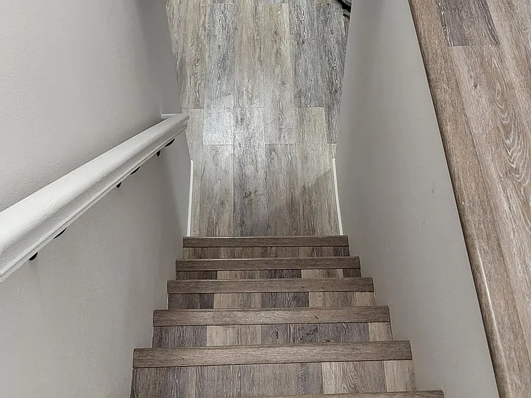Stairs to the washer and dryer.