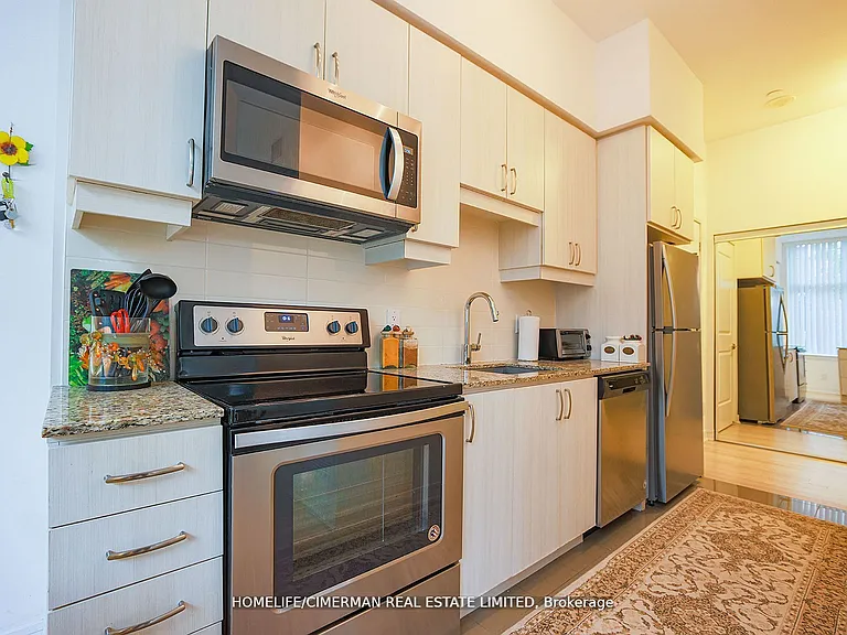 9191 Yonge St #103 — Photo 6
