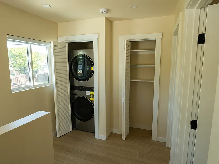 Laundry and linen closet.