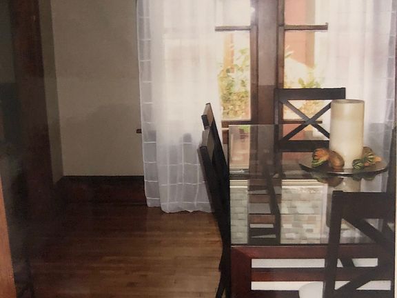 Dining room is large enough for a large dining table