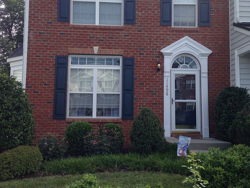 All brick front with storm door