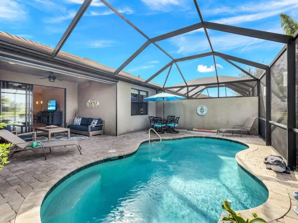 7627 Jacaranda Ln, Naples, FL 34114