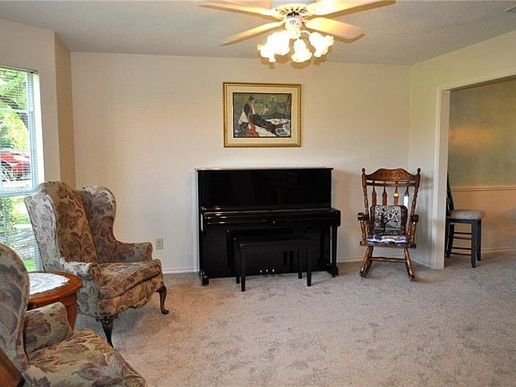 As you enter this lovely home the formal living room is on your left.Bay windows make a perfect seating area. Brand new carpet. Neutral colors for you to add your decor and style.