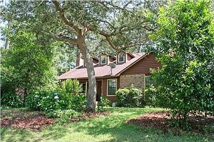 In the heart of Rocky Bayou Country Club Estates...