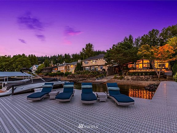 Permitted dock with new flow-thru surface & supports; features swim step, swim ladder, power outlets, water spigot, dock lighting