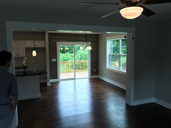 Living room opens to dining space