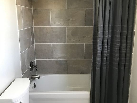 Beautifully tiled full bath.