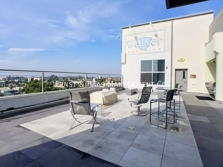 115 W 4th St #210 — Photo 40