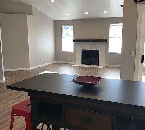 View from kitchen into living room, movable kitchen island