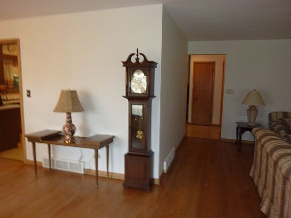 Entry with all Hardwood flooring