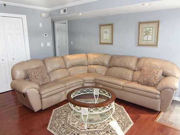 Leather sectional sofa with Queen sleep sofa