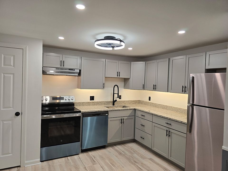Brand new kitchen with new cabinets, Granite counter, stainless steel, appliance, new ceiling, lighting, and fan