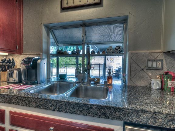 Garden window overlooks pool