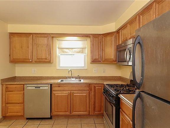 KITCHEN has more than ample cabinetry.