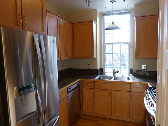 Kitchen features plenty of storage space, closet pantry and stainless steel appliances.