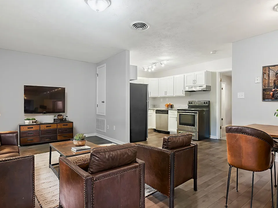 Unwind in the modern elegance of Arbor Terrace. This spacious living area features sleek furnishings, updated appliances, and warm tones that create a welcoming atmosphere. Make this your new home today! Schedule a tour now.