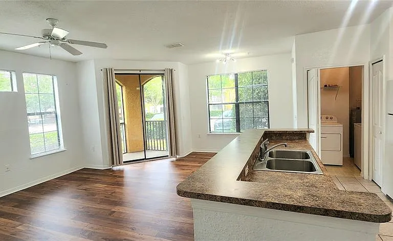 6171 Metrowest Blvd #107 — Photo 25