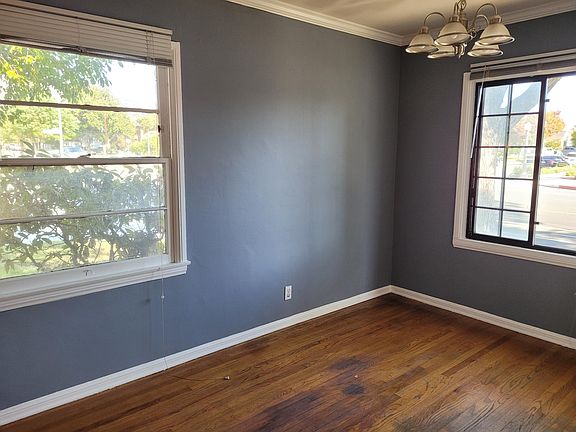 living & dining rooms with lots of windows; well-lit rooms