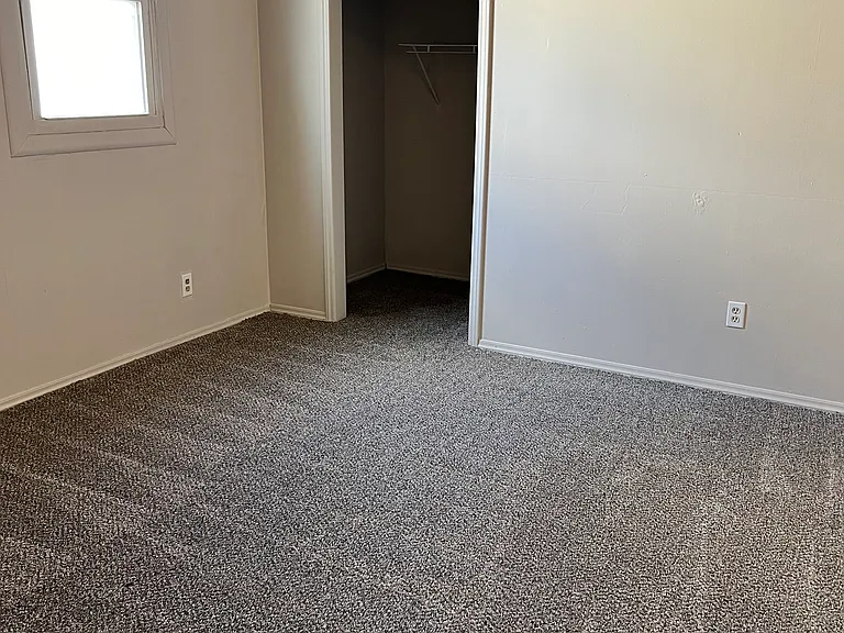 1st bedroom. new carpet, new paint