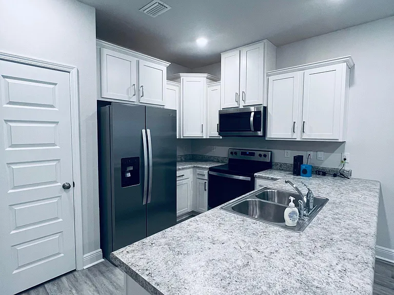 6311 Grove Park Dr — Photo 2