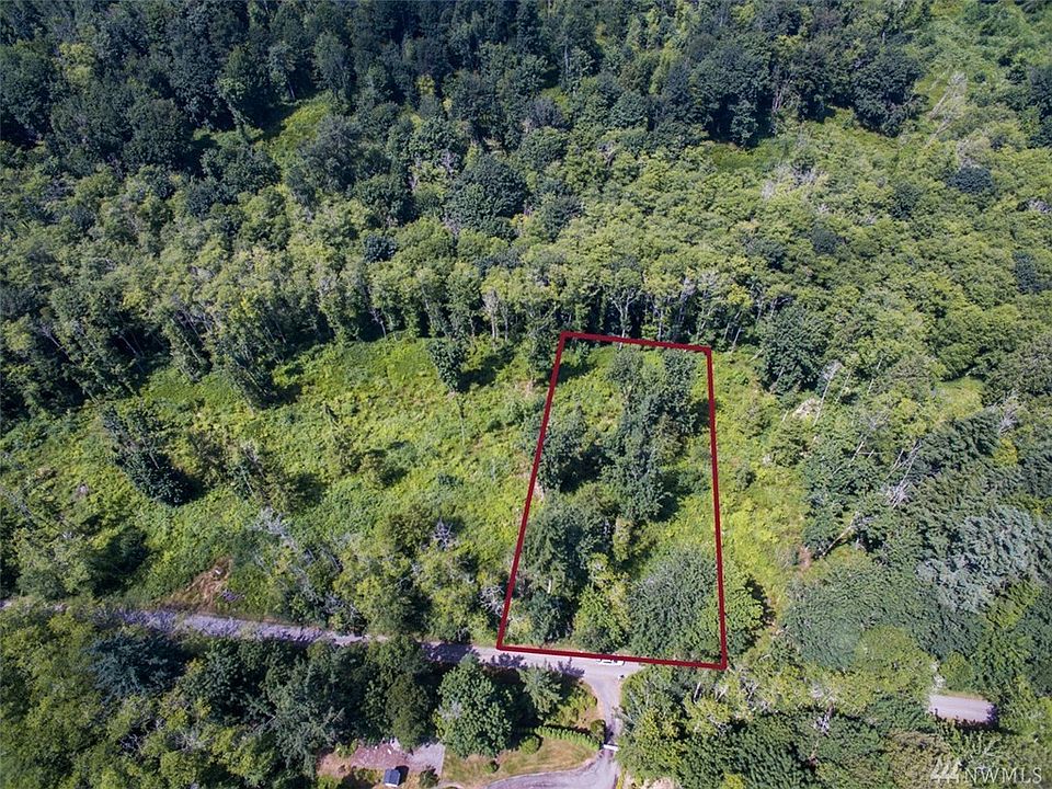 1st image of 9234 NE Country Woods Ln Lot 12