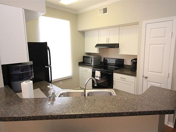 3rd image of 9726 Lake Chase Island Way