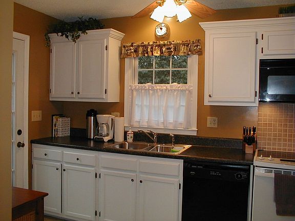 Updated kitchen with easy access to the deck for summer cook outs.