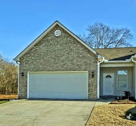 FRONT ENTRANCE & GARAGE