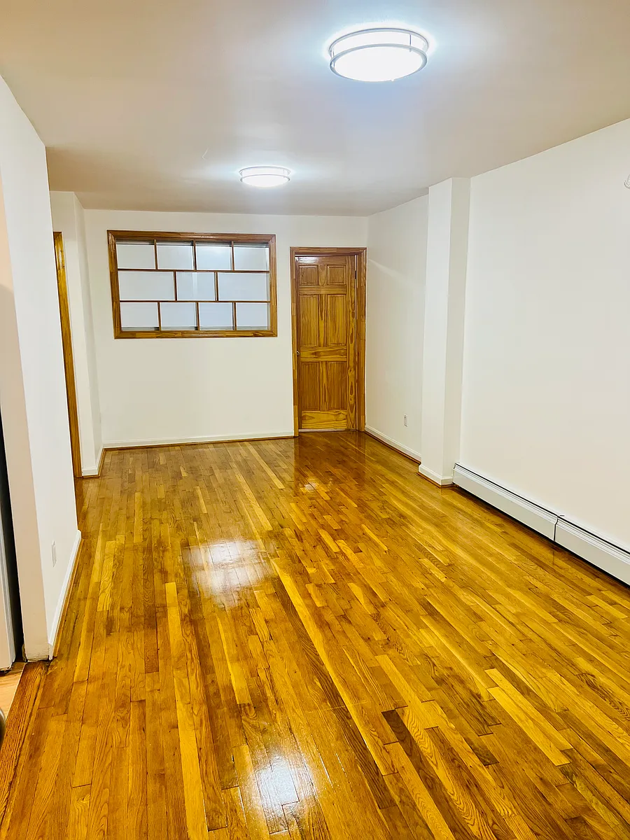 Building Photo - 240-53 68th Ave #1F