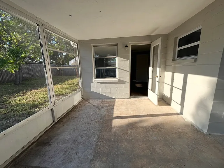 Looking back into the master bedroom- we have changed the door to a full white wooden door for privacy