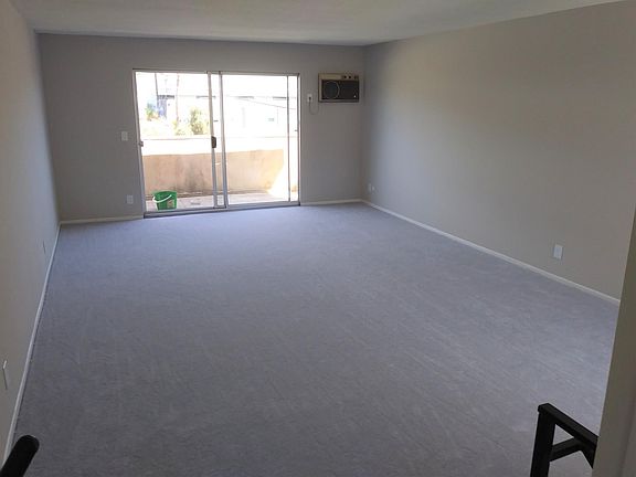 Living room view from entry stairs.