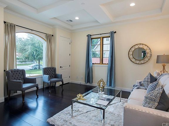Elegant Living Room with large dual windows and wa