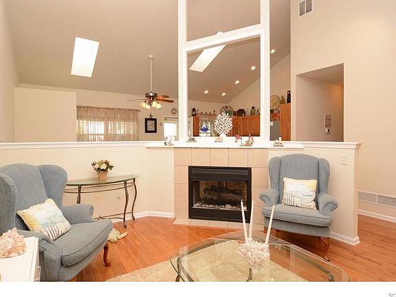 anAnother view of the Living Room with gas fireplace.