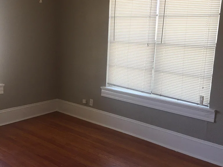 Bed room with hard wood floor