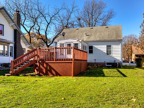 View of deck & Sunroom
