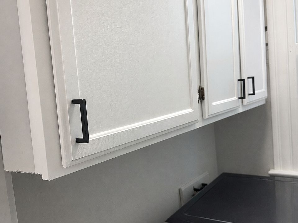 Walk in pantry with washer.